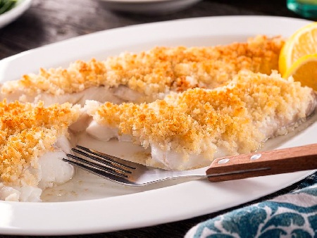 Хрупкава печена бяла риба тилапия на фурна - снимка на рецептата